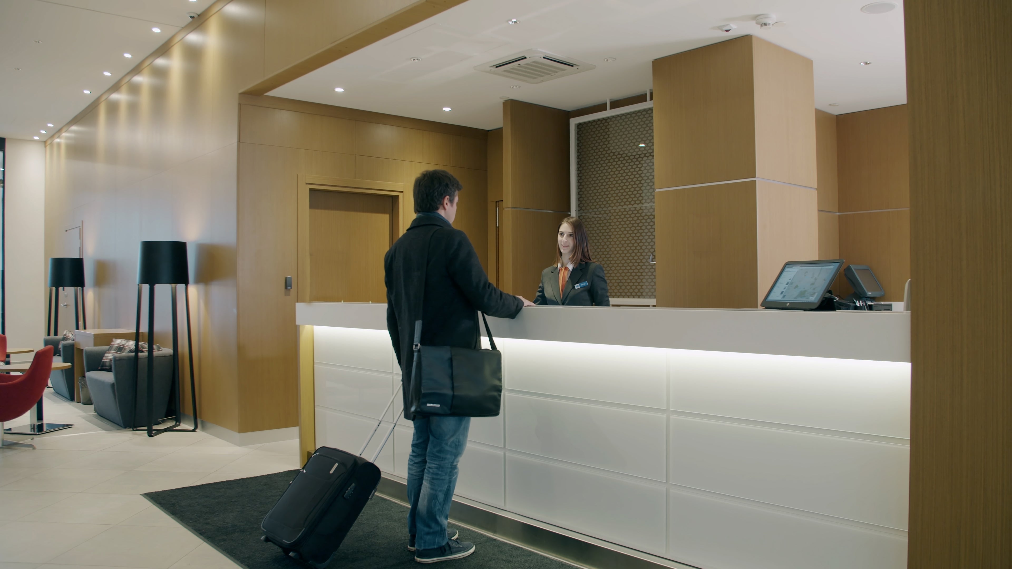 Man at reception desk