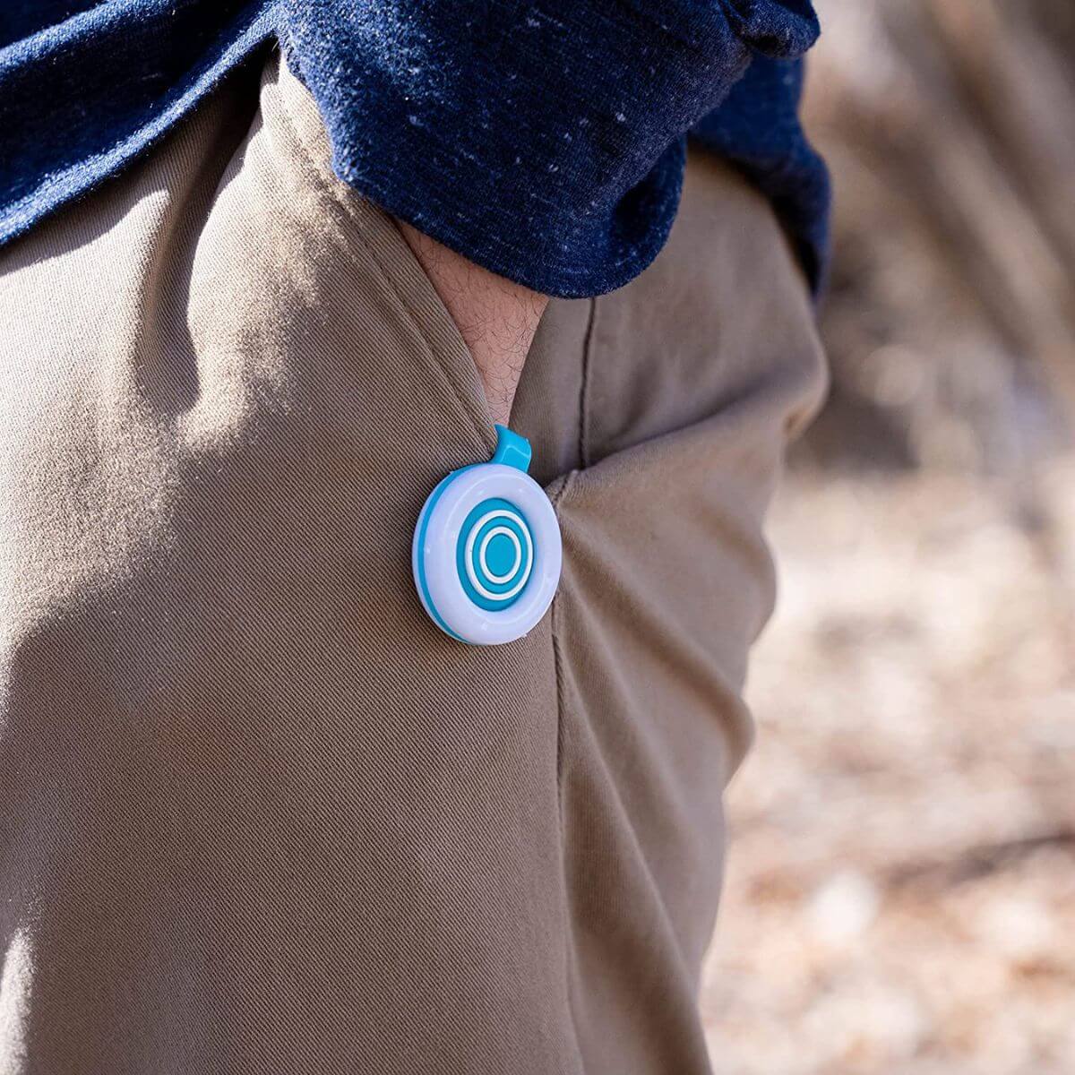 Mosquito repellent clip on a pant pocket